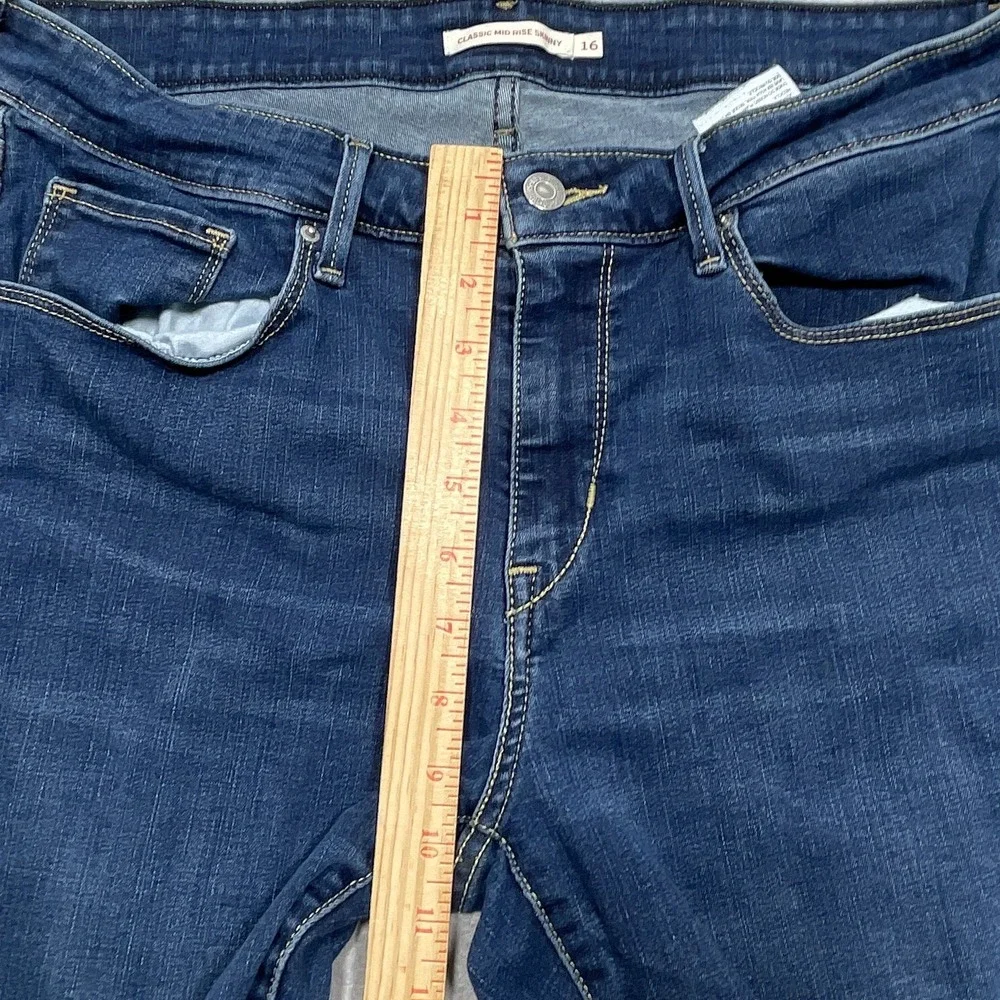 Levis Classic Mid Rise Cut Off‎ Shorts Women 16 Raw Hem Dark Blue Denim Casual